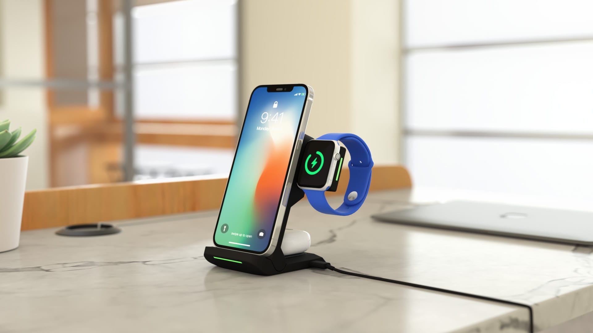 ChargeTree Go on top of a desk charging three different devices